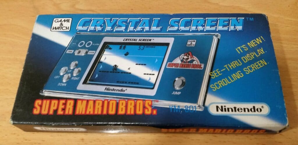 Super Mario Bros Crystal Screen (YM-801) in very good condition with box for a hammer price of £750.
